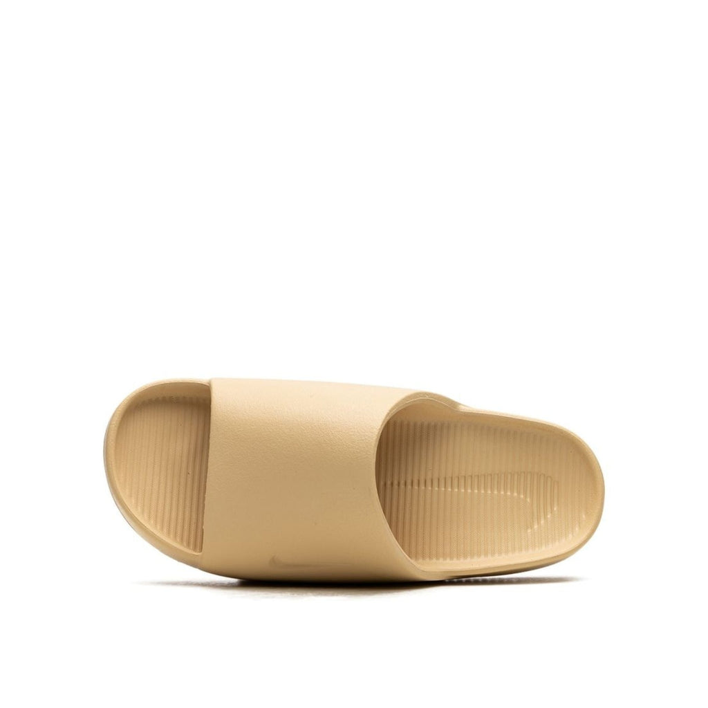 Nike
Calm "Sesame" slides